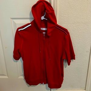 Red zip up shirt with a hood
